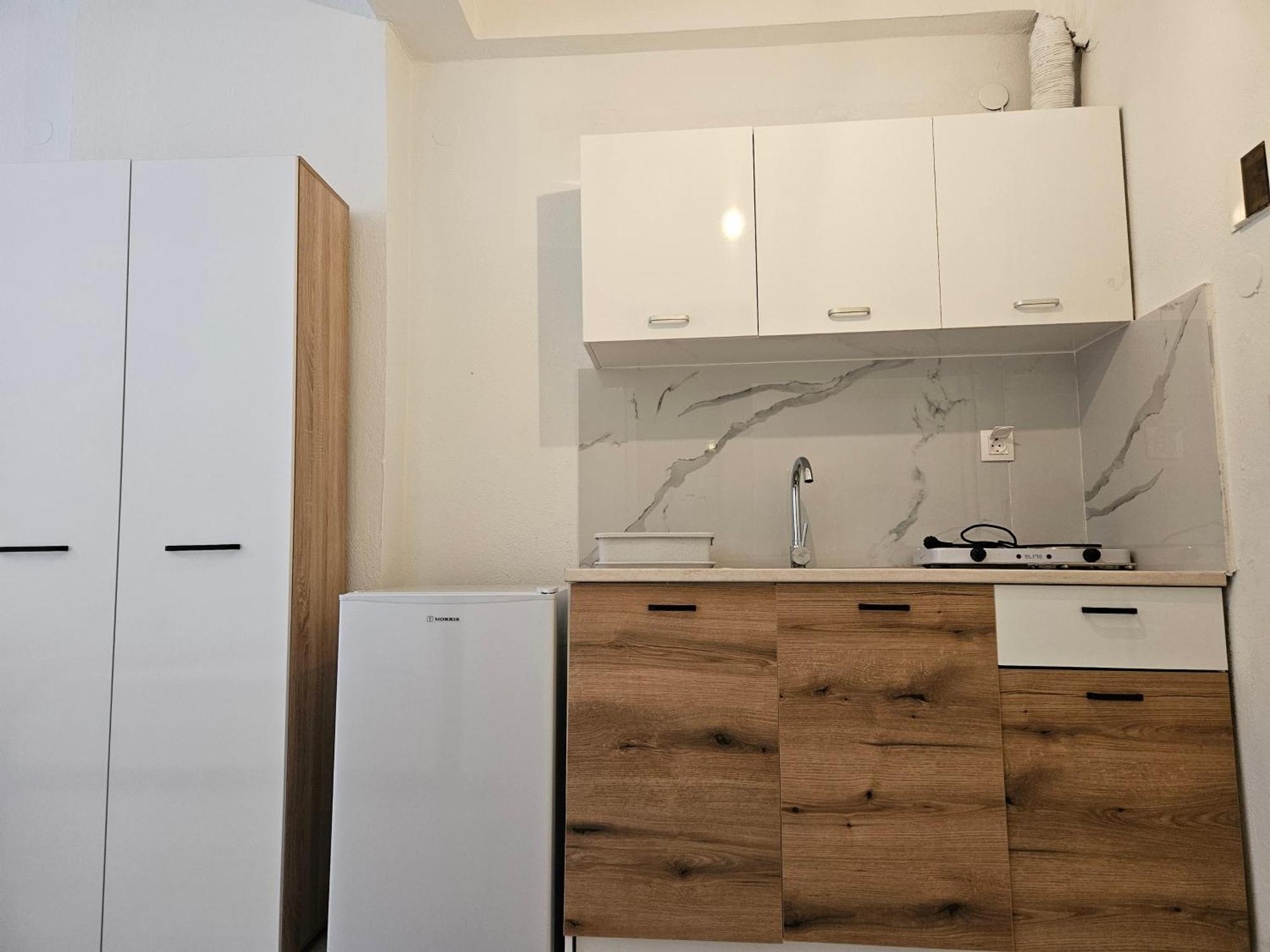 Sivilla Studios Afytos Bilik gambar